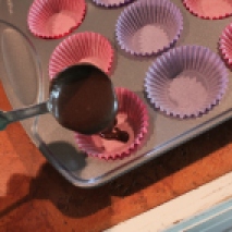 Fill each muffin tin liner with the chocolate mixture.